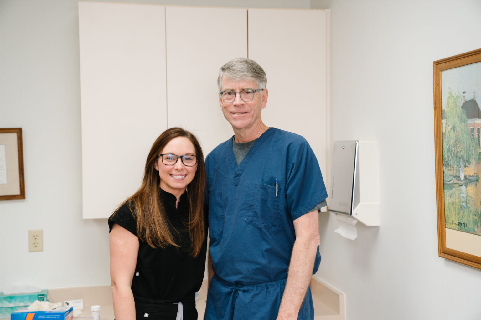An Oxford OBGYN physician and staff member in a procedure room